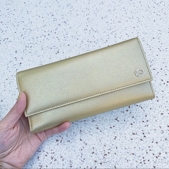 Gucci Handbags - NWT Authentic Gucci Leather Trifold Long Wallet